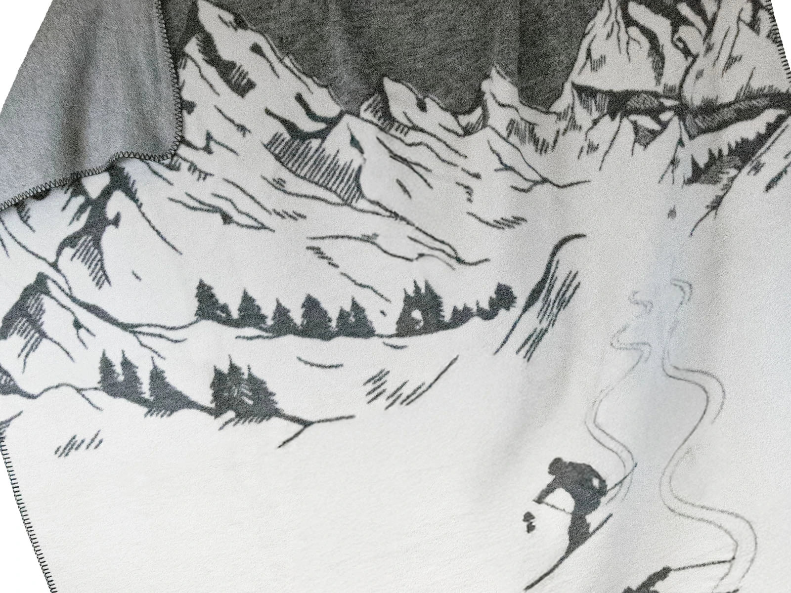 Coperta Softcotton Sciatori Calore e Montagna dettaglio tessuto colore grigio