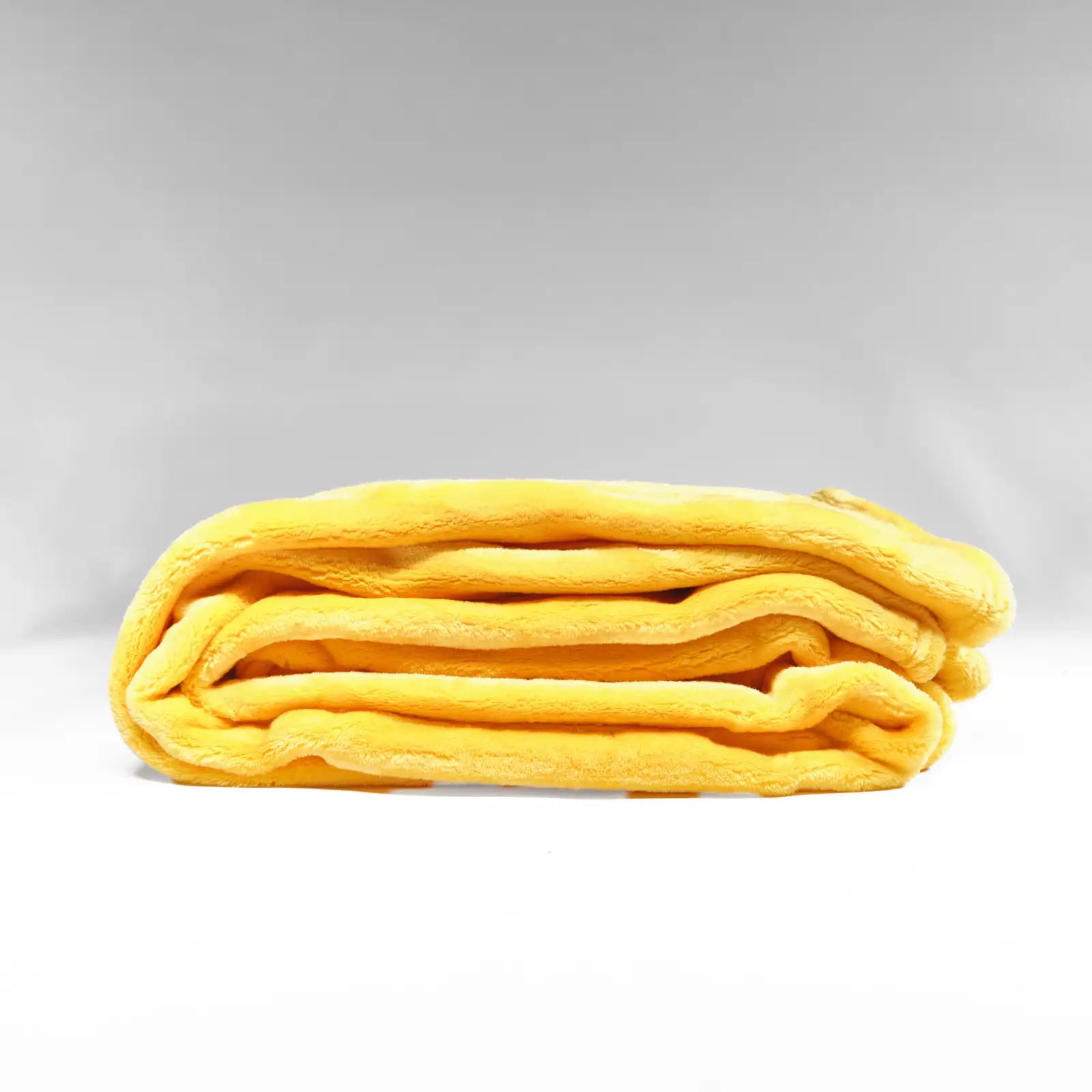 Doudou à carreaux micropolaire uni