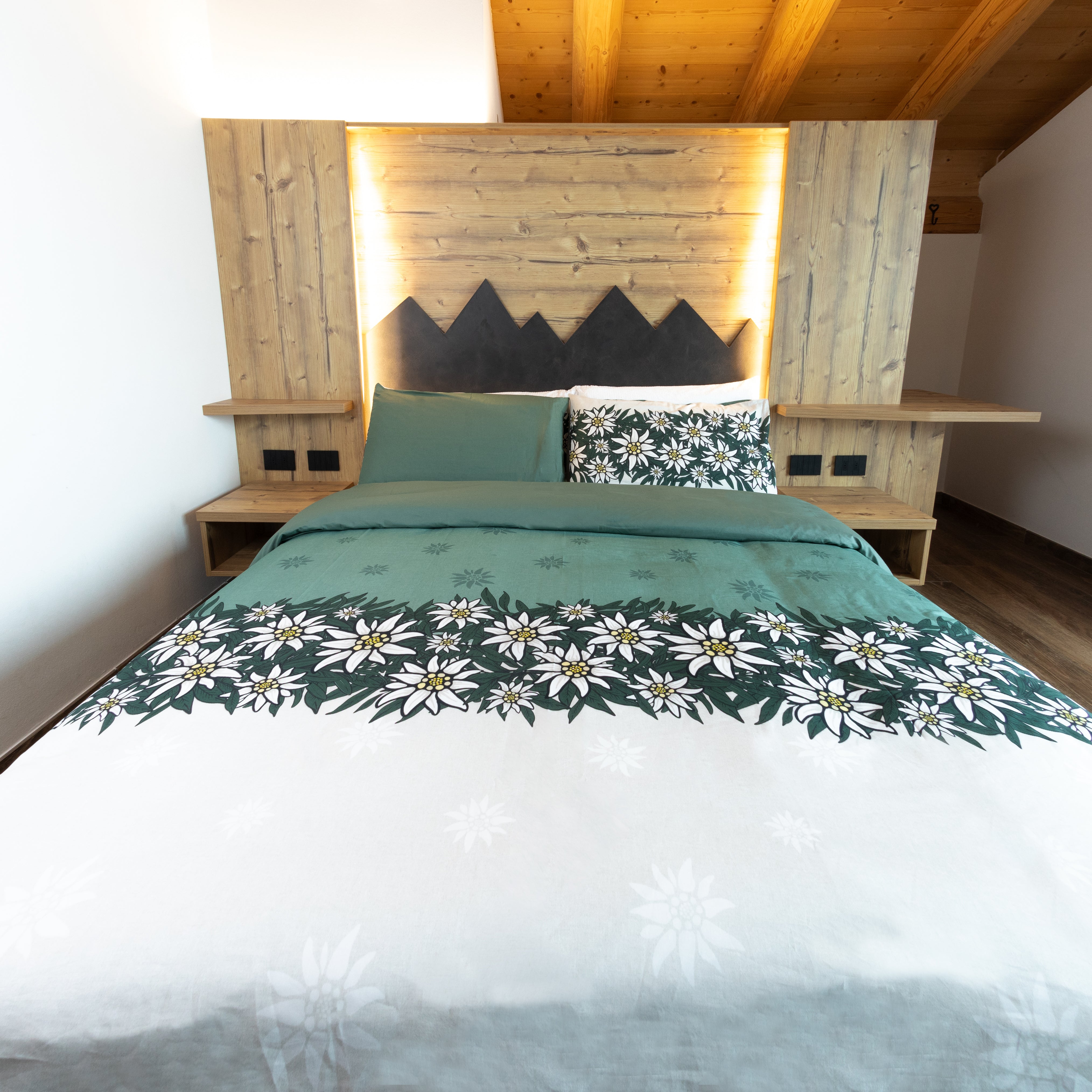 Parure copripiumino Alpiflora in 100% cotone Daunex letto frontale