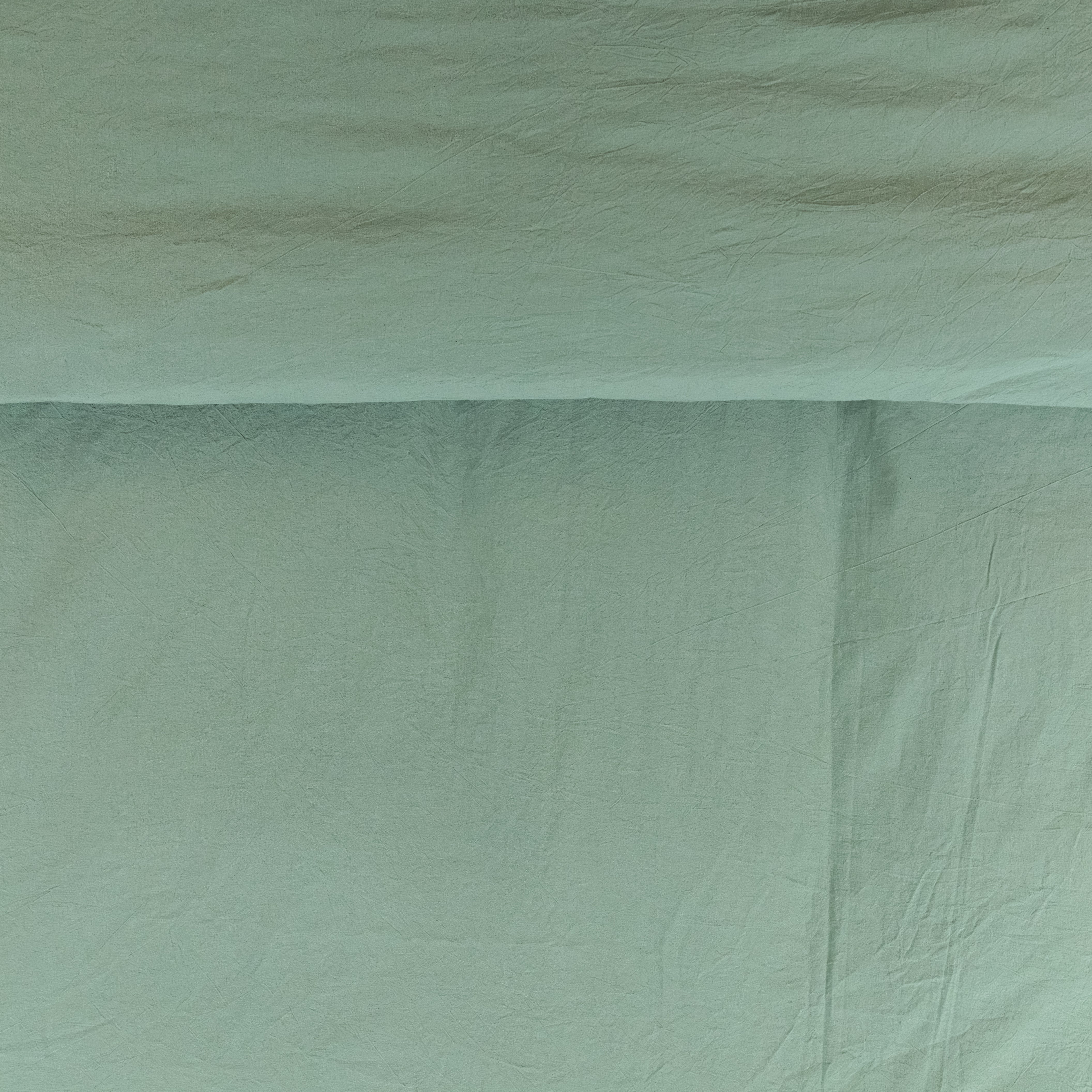 Parure copripiumino no stiro Fresh cotton stone wash Daunex ambientata colore verde dettaglio tessuto
