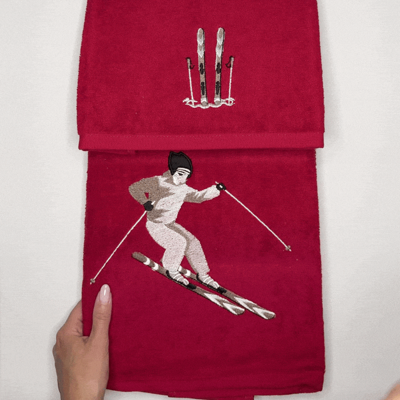 Paar Handtücher, bestickt mit Daunex-Skifahrer-Design