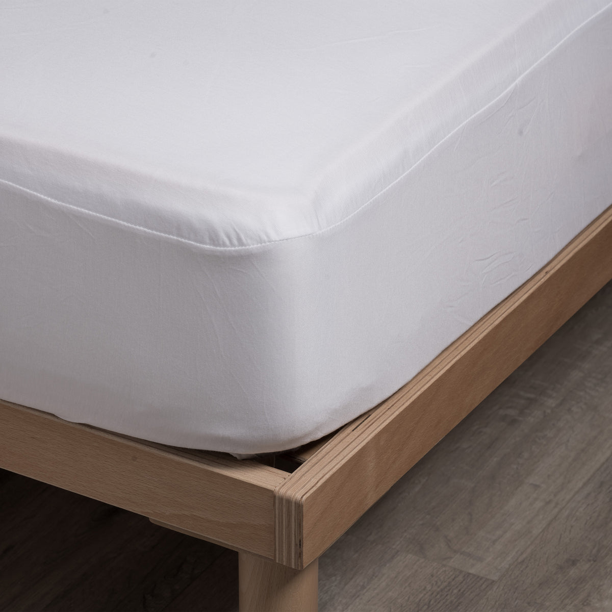 Coprimaterasso Tencel Daunex con membrana impermeabile steso sul materasso