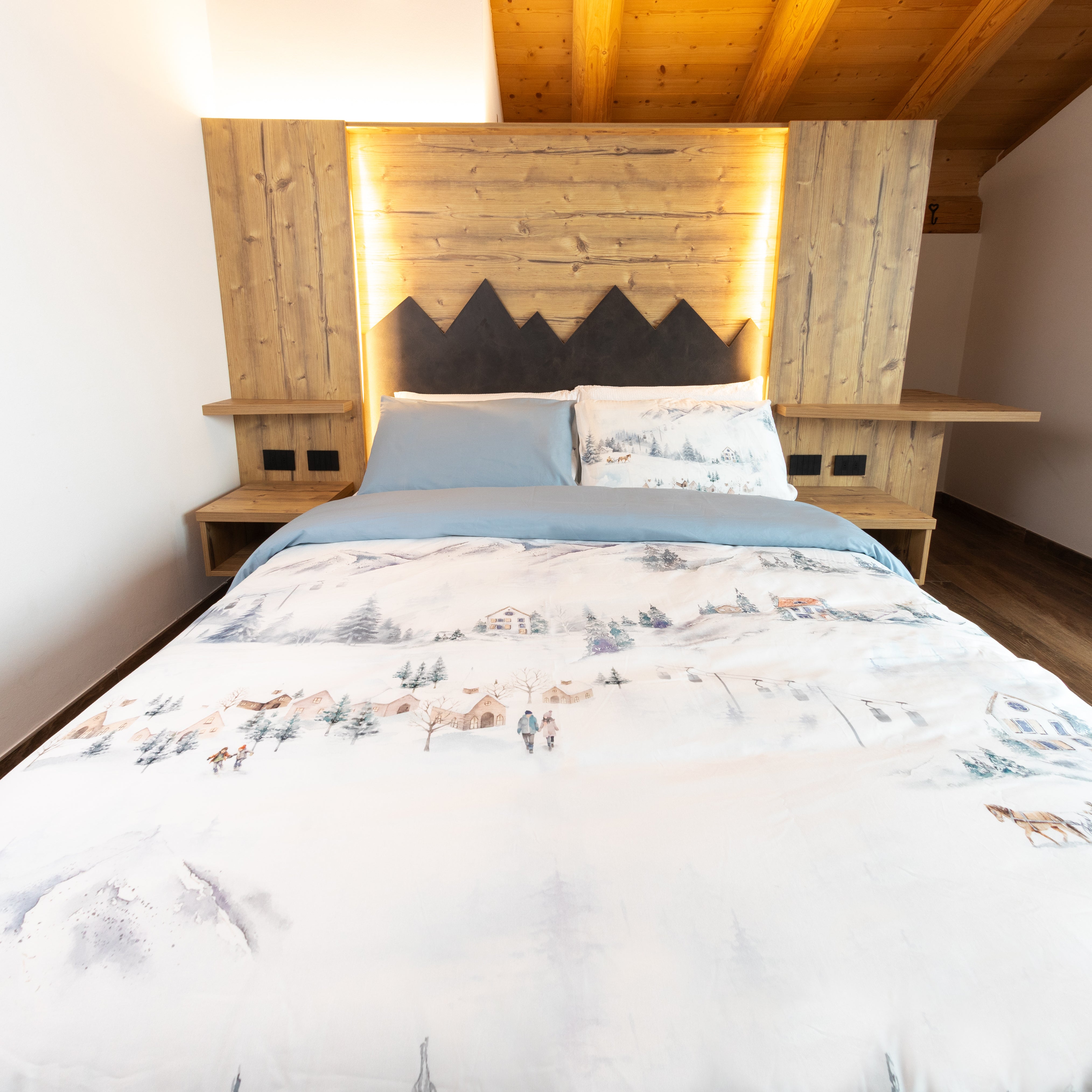 Parure copripiumino Norvegia in 100% cotone Daunex letto frontale