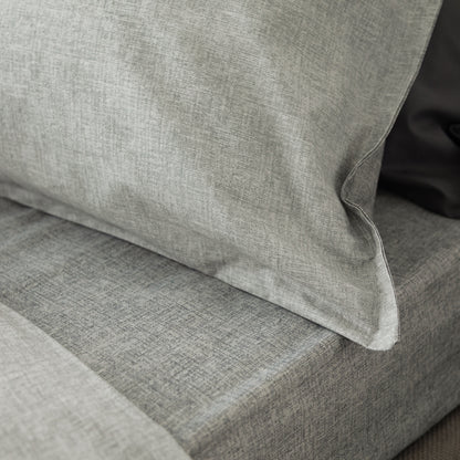 parure-copripiumino-intreccio-grigio-perla-dettaglio-letto